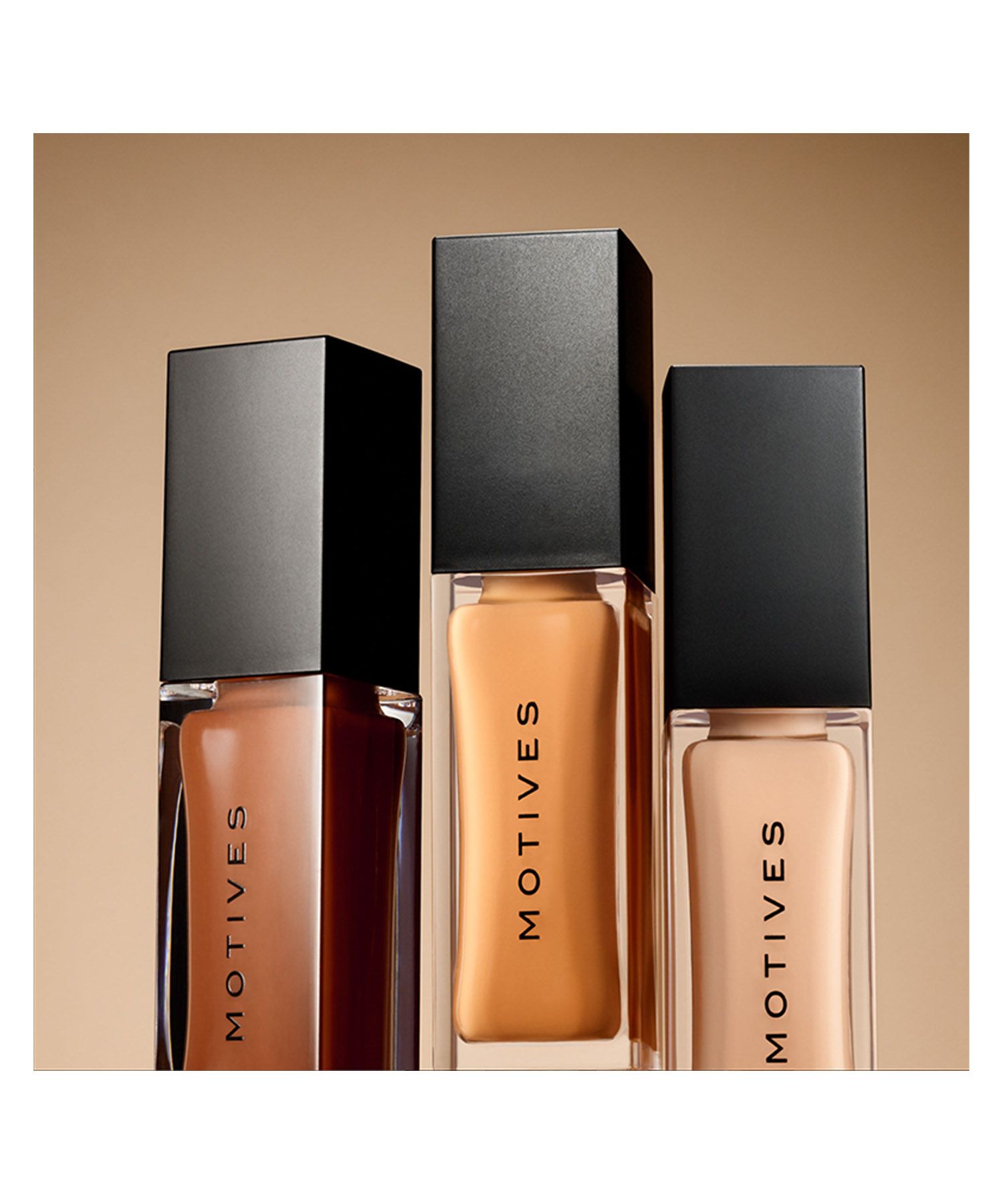 three bottles of motives foundation are lined up next to each other