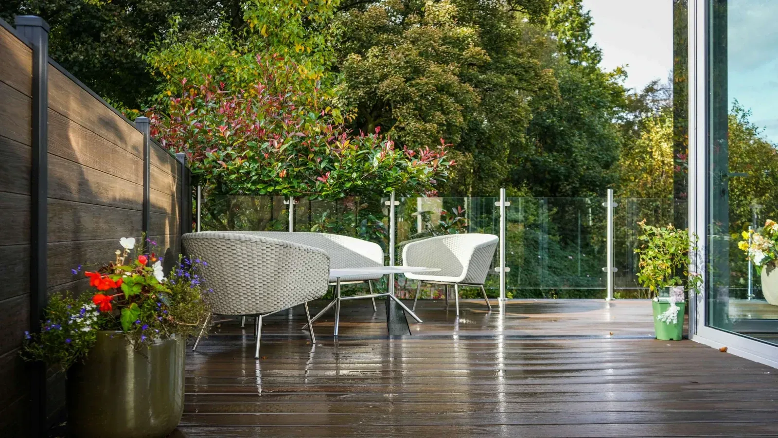 Rain soaked patio decking by EcoDeck Scotland