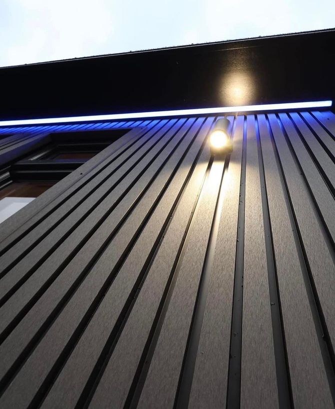image of our fluted composite cladding with ecternal lighting