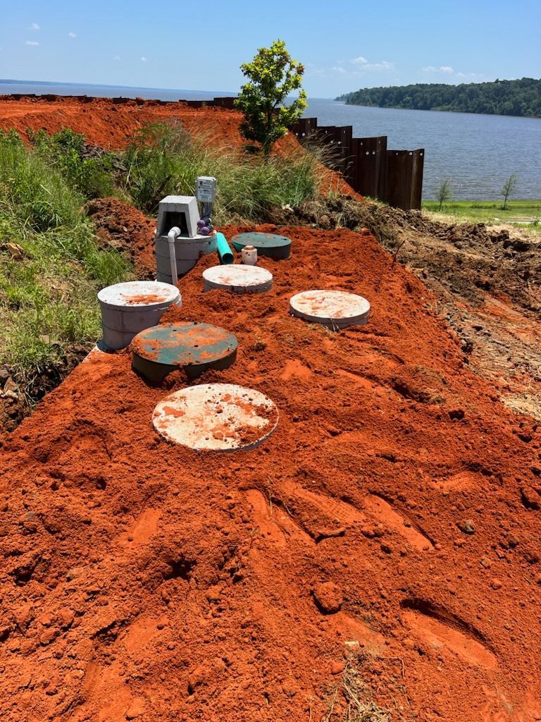 A septic system is being built next to a body of water.