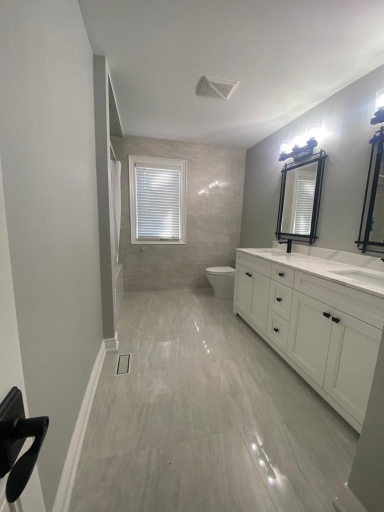 A subtly renovated bathroom of a client