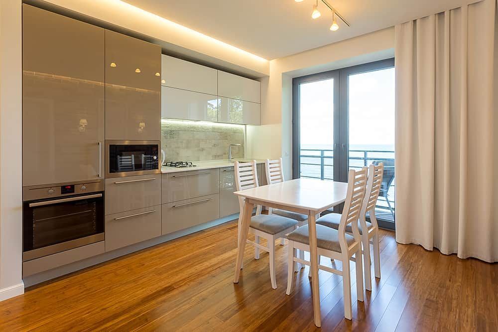 Open pantry kitchen with small and minimal dining space