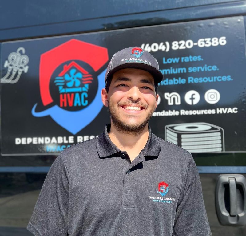 A man standing in front of a sign that says hvac