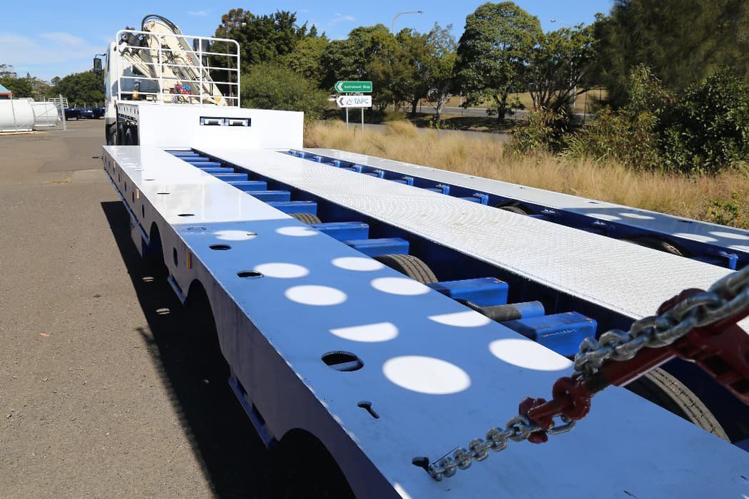 drop deck widener with bi fold ramps