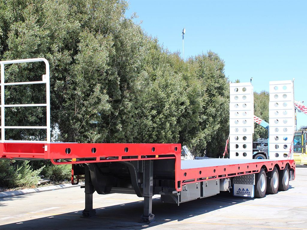 drop deck trailer with bifold ramps
