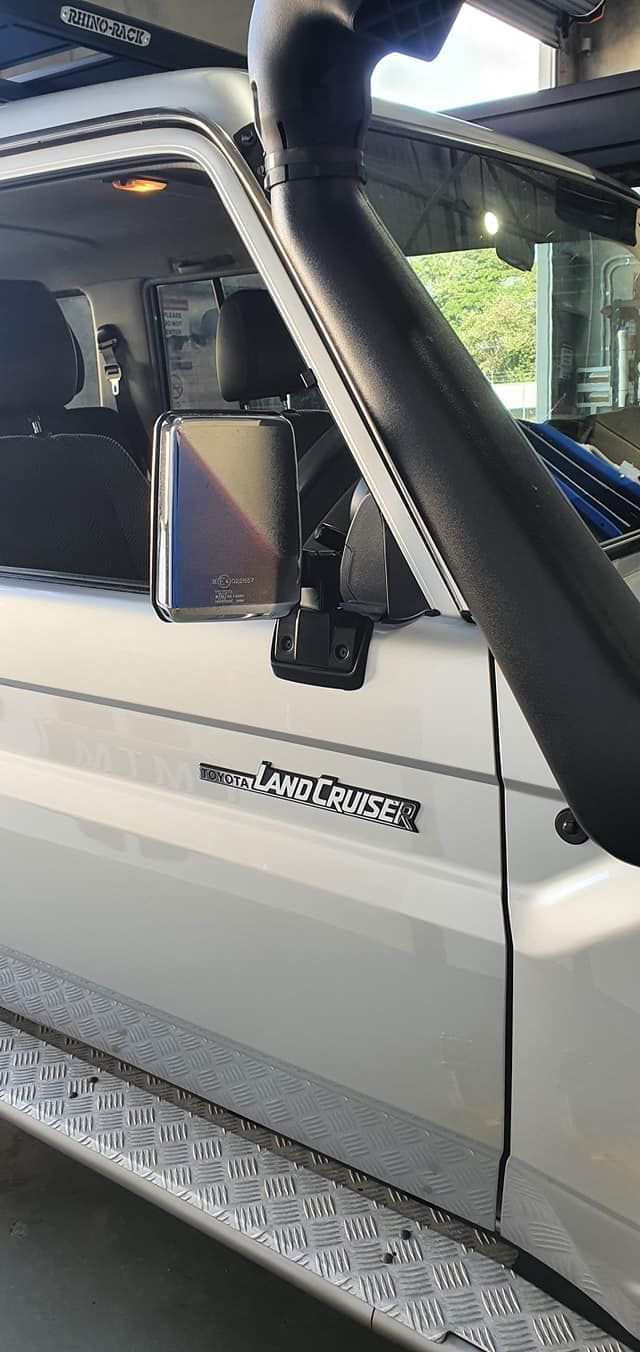 A White Truck Parked In A Garage — MTM Automotive in Bentley Park, QLD