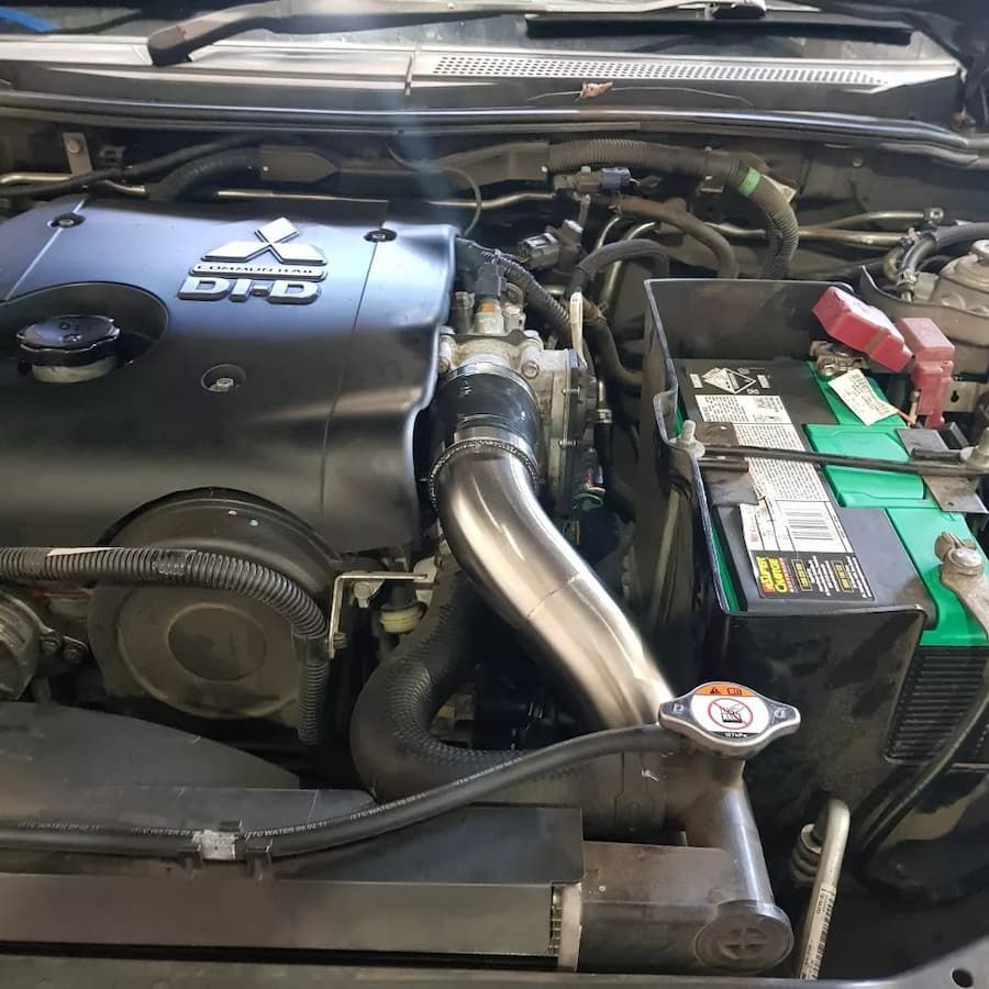 A Close Up Of The Engine Of A Car — MTM Automotive in Bentley Park, QLD