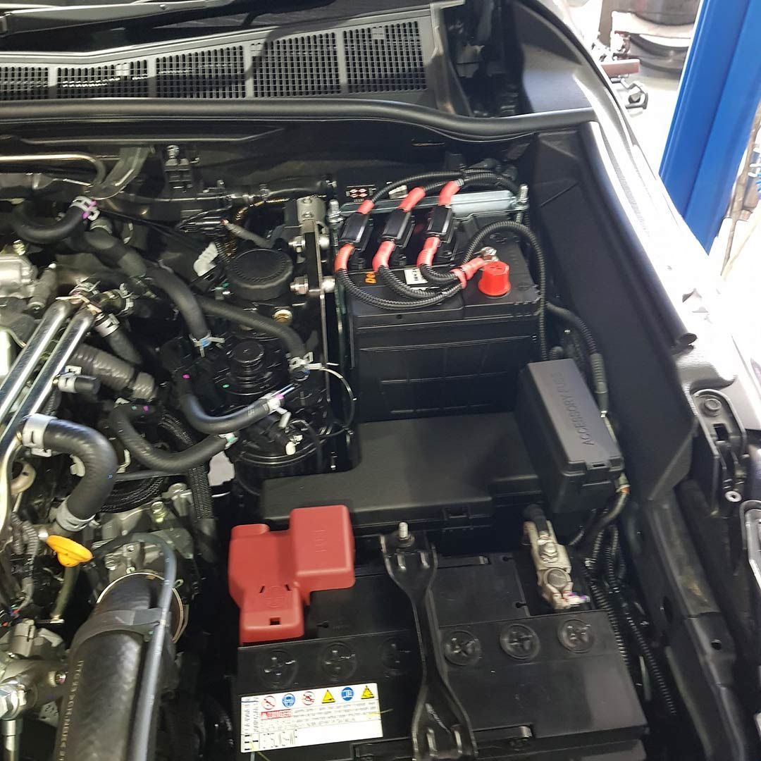 The Engine Of A Car Is Shown With The Hood Open — MTM Automotive in Bentley Park, QLD