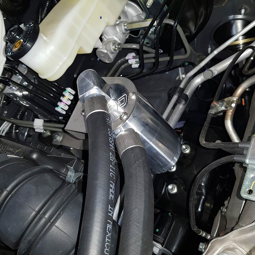 A Close Up Of A Car Engine With A Hose That Says Mexico On It — MTM Automotive in Bentley Park, QLD