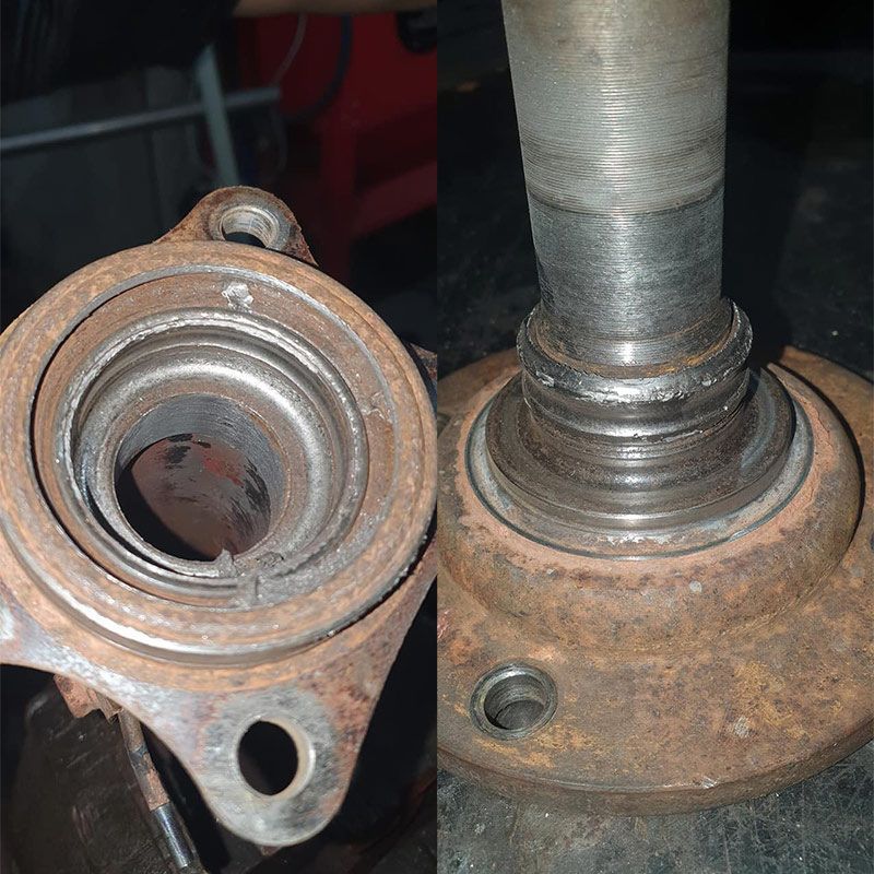 A Close Up Of A Rusty Piece Of Metal With A Hole In It — MTM Automotive in Bentley Park, QLD