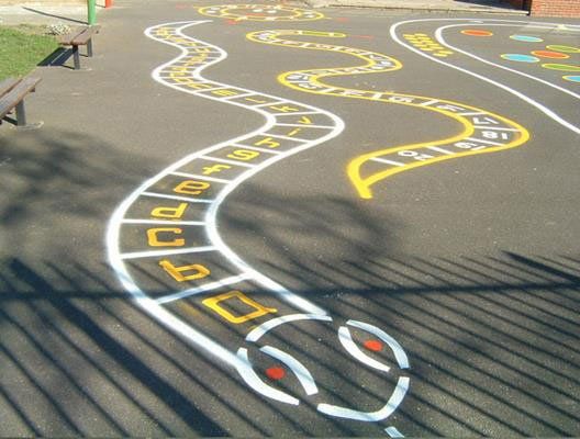 A playground with alphabetical and numerical snake designs