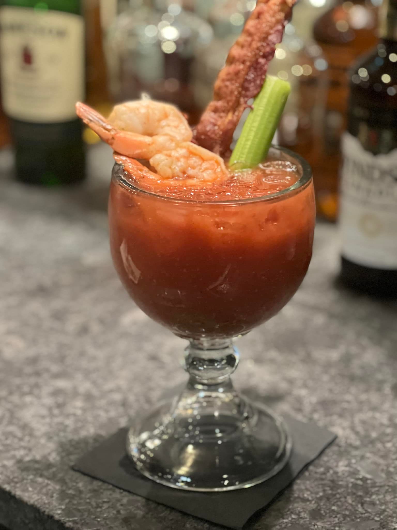 Bloody Mary Drink with shrimp bacon and vegetables