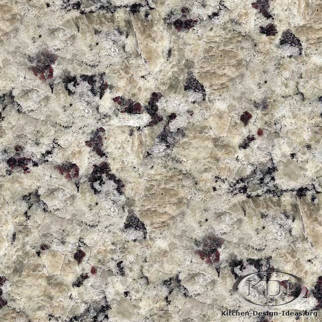 A close up of a granite counter top with purple spots.