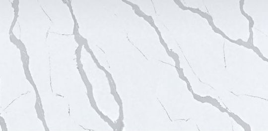 A close up of a white quartz counter top with a marble texture.