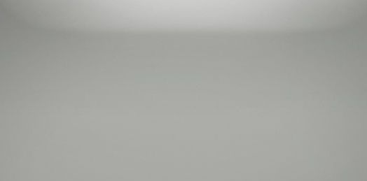 A gray background with a gradient in the middle