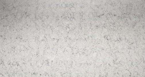 A close up of a white marble counter top.