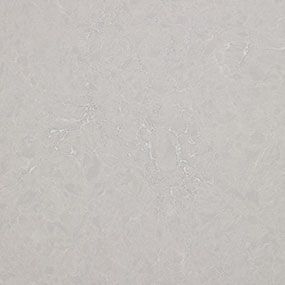 A close up of a white tile with a gray texture.