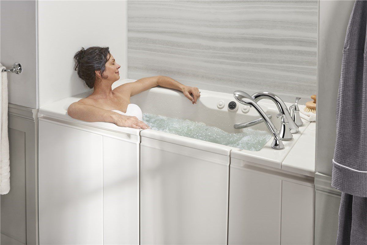 Woman Bathing at the Luxury Bathroom  — Moline, IL — Midwest Bath Co.