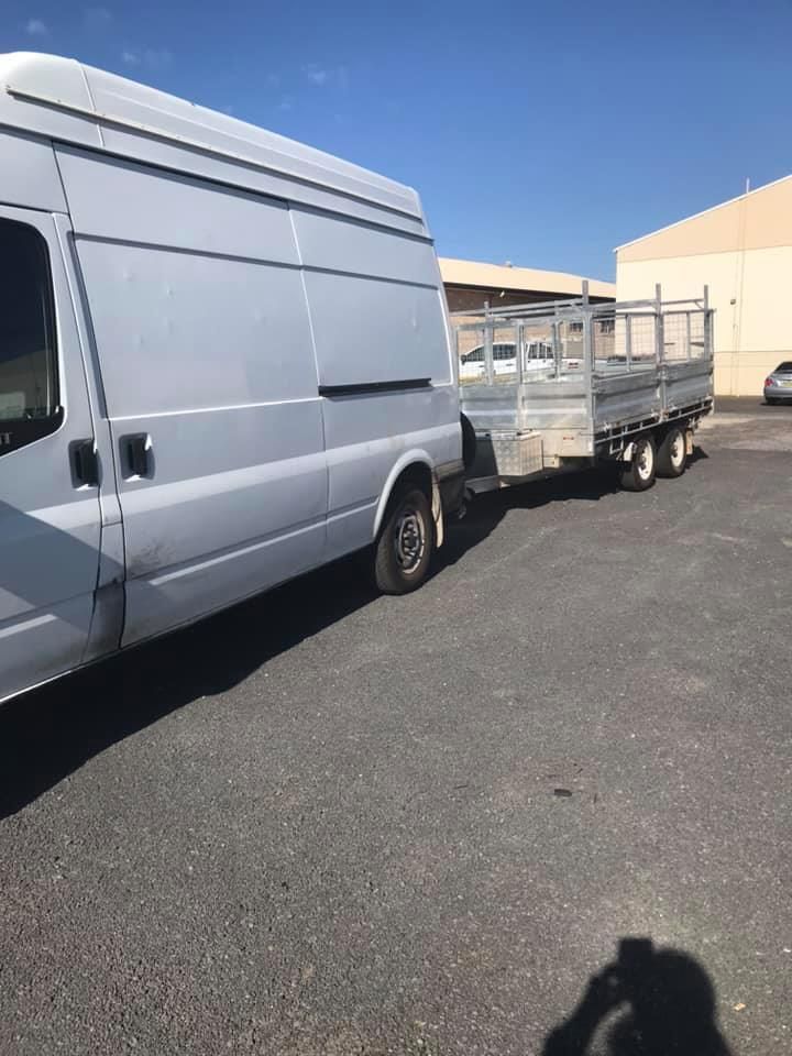 Two Vans Are Parked Next to Each Other in a Parking Lot - Turtle Couriers in Tamworth, NSW