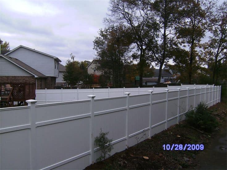 White Vinyl Fence In A Cottage Village — Madison, TN — Music City Fence Company