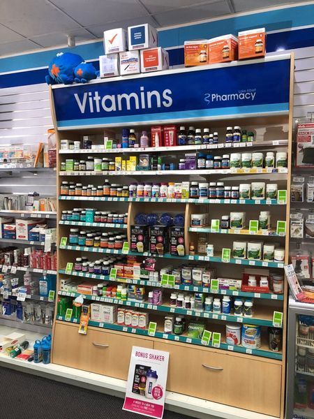 A display of vitamins in a pharmacy
