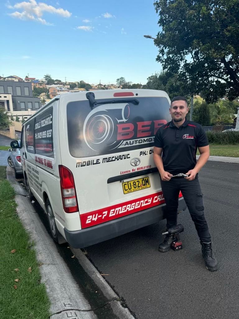 Mechanic Standing in front of Mobile Work Vehicle — BEB Automotive In Berkeley, NSW