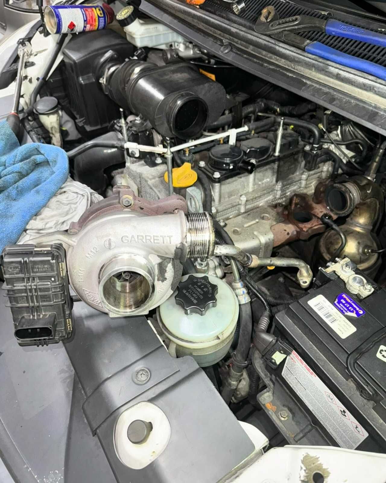 A Car Engine with A Detached Turbocharger — BEB Automotive In Cronulla, NSW