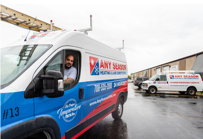 Technician performing furnace installation services in Orland Park, IL