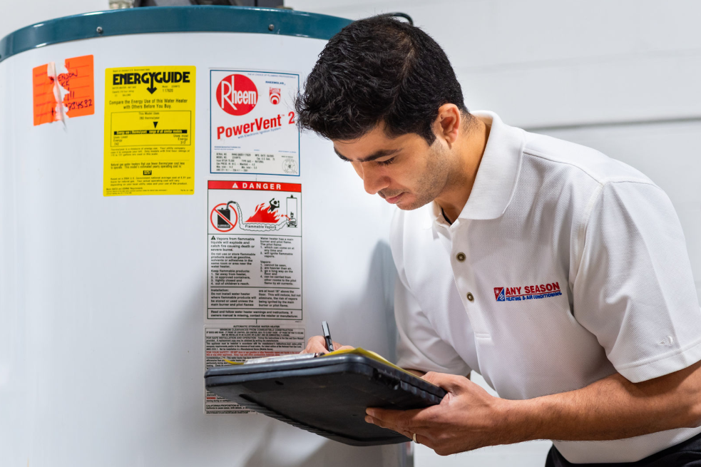 Water Heater — Guy Checking On Water Heater in Tinley Park, IL