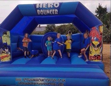 children enjoying the Hero Bouncer bouncy castle