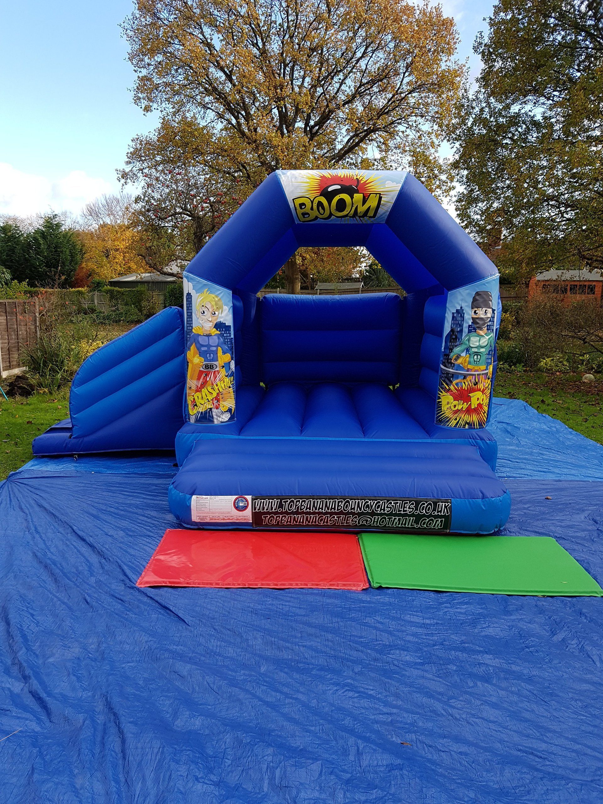 slide combo bouncy castle with super hero theme