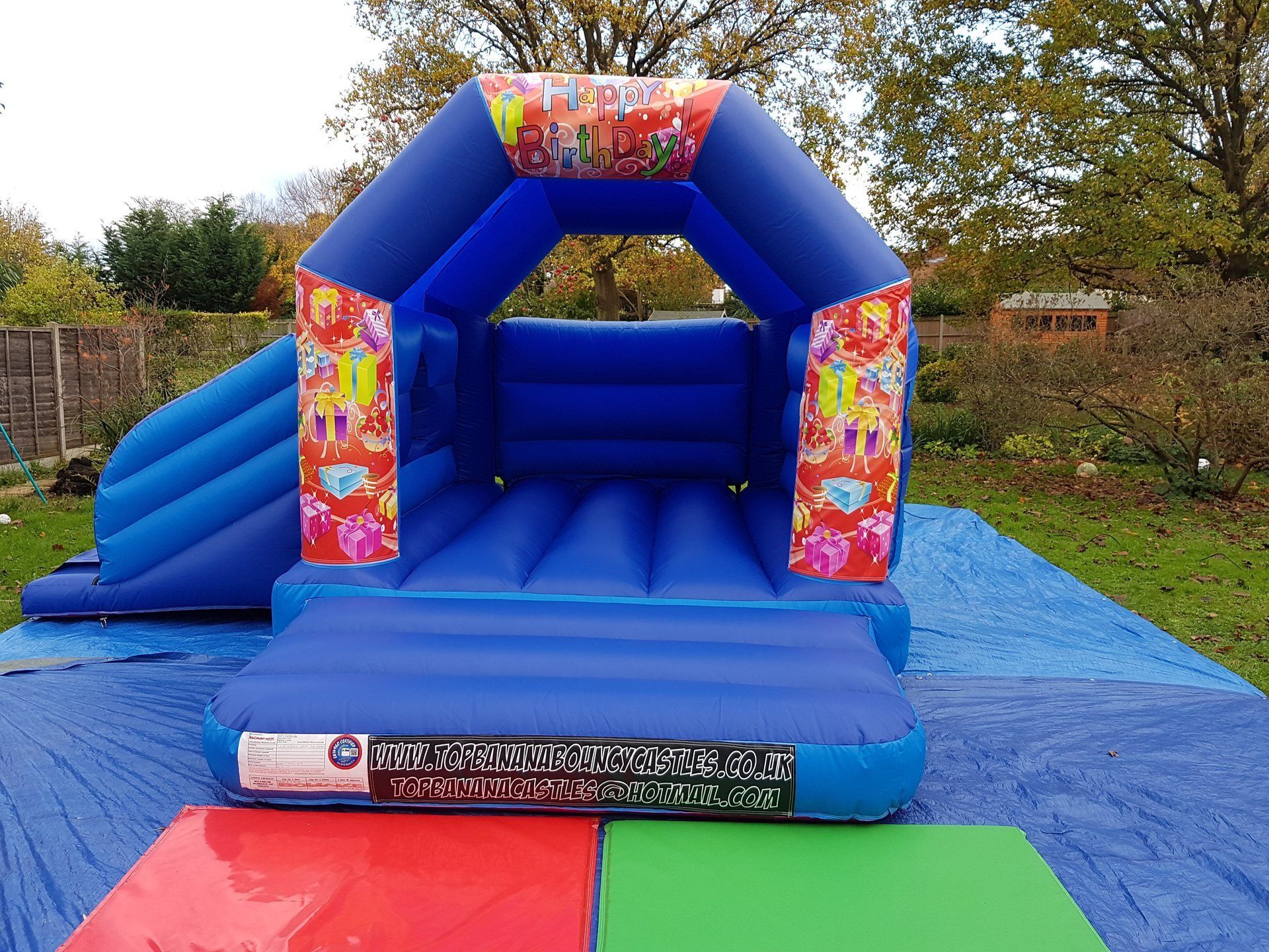 slide combo bouncy castle with birthday theme