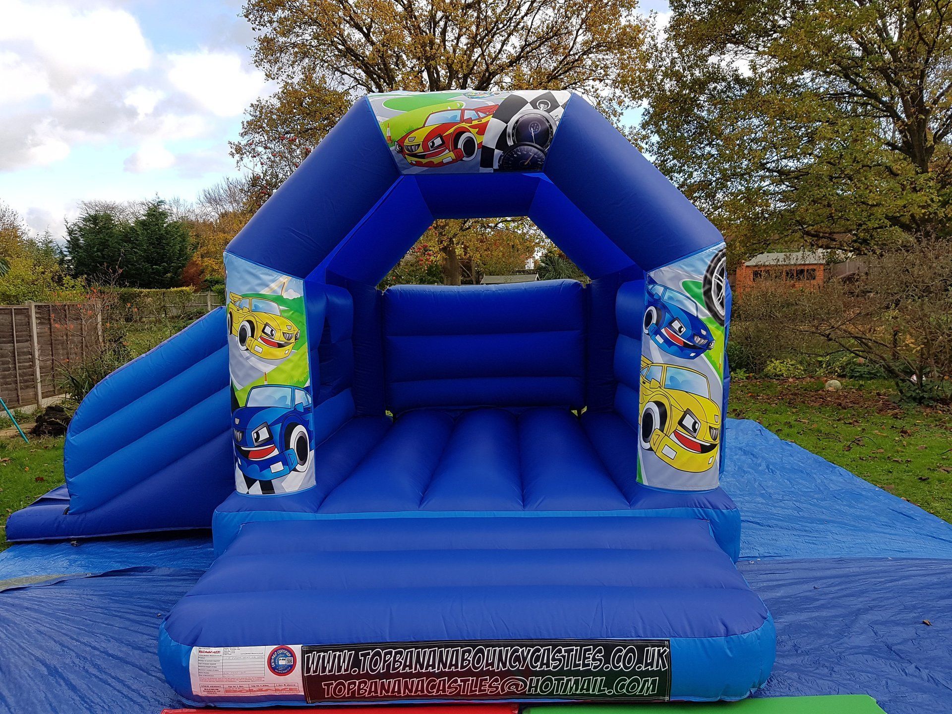 slide combo bouncy castle with racecar theme