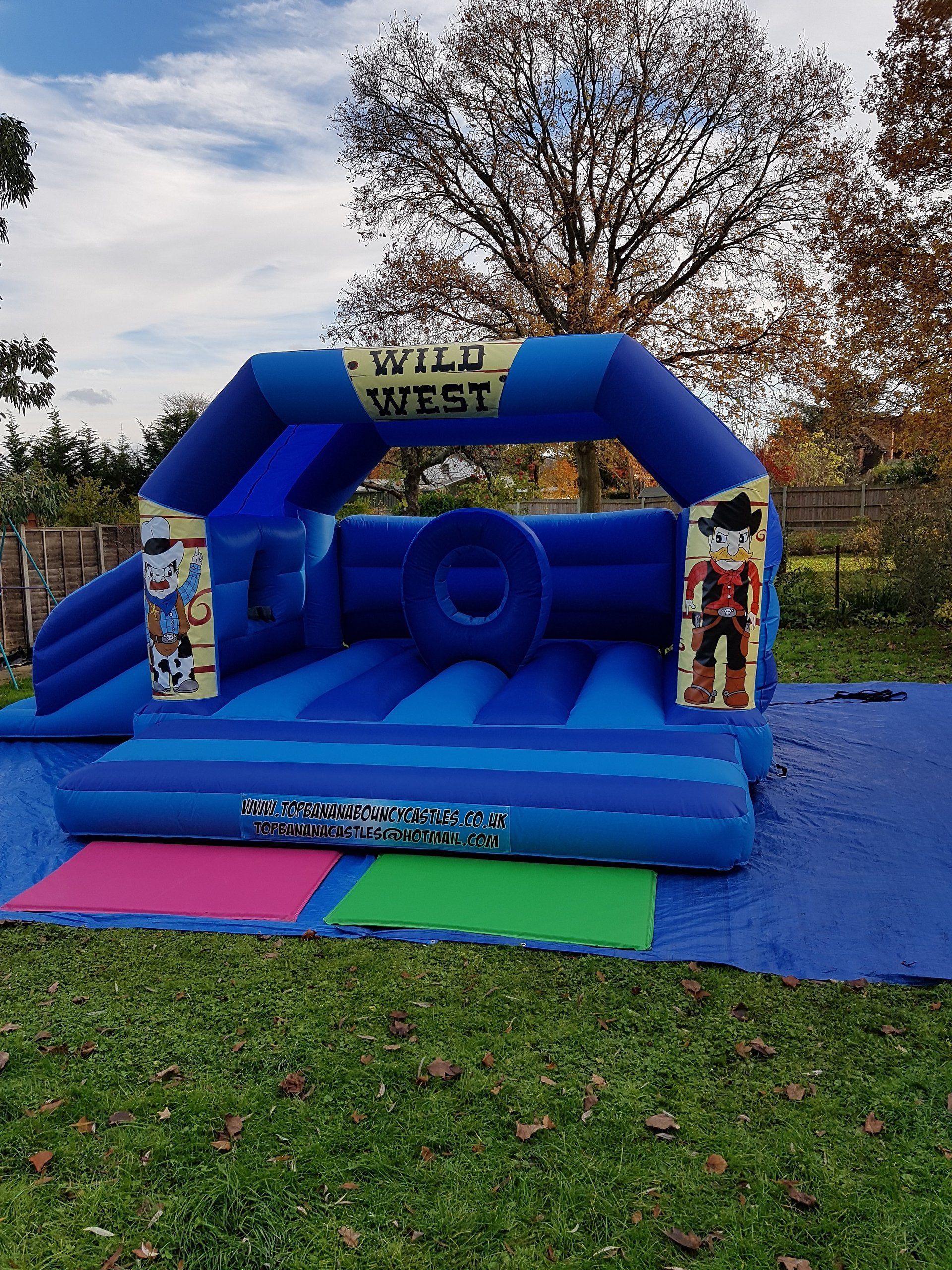 large bouncy castle with wild west artwork