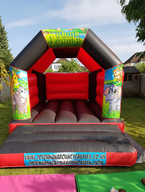 adult red and black bouncy castle with jungle theme