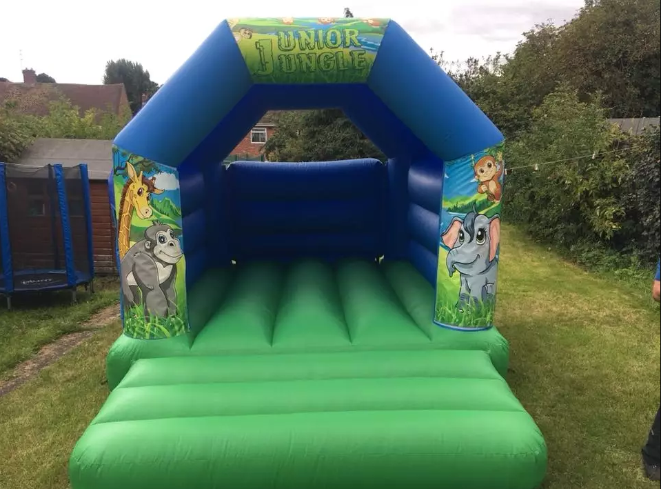 green and blue jungle small bouncy castle