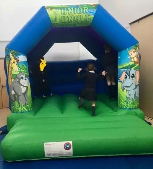 green and blue jungle small bouncy castle