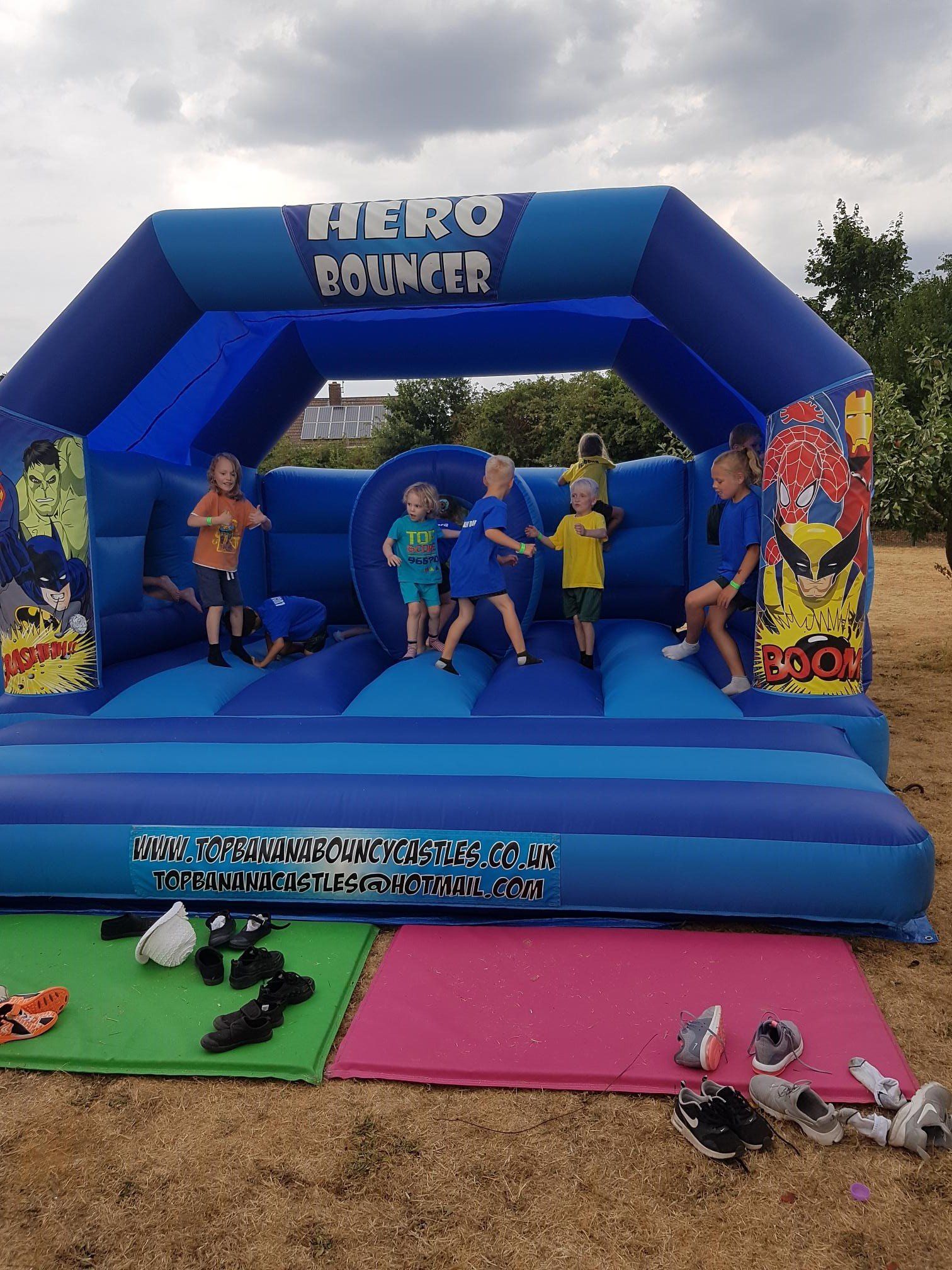super hero theme large bouncy castle