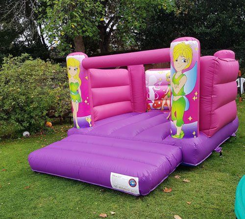 pink and purple fairy themed bouncy castle