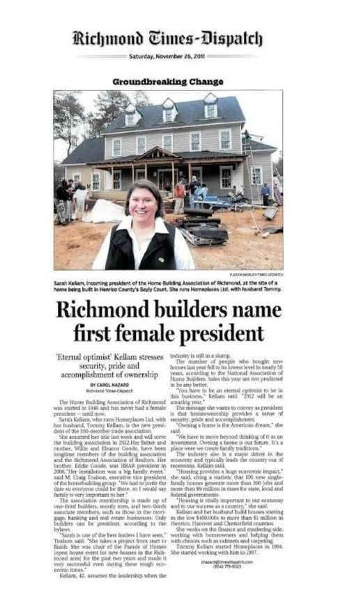 A woman stands before a partially constructed house, pictured in a Richmond Times-Dispatch article about a new president.