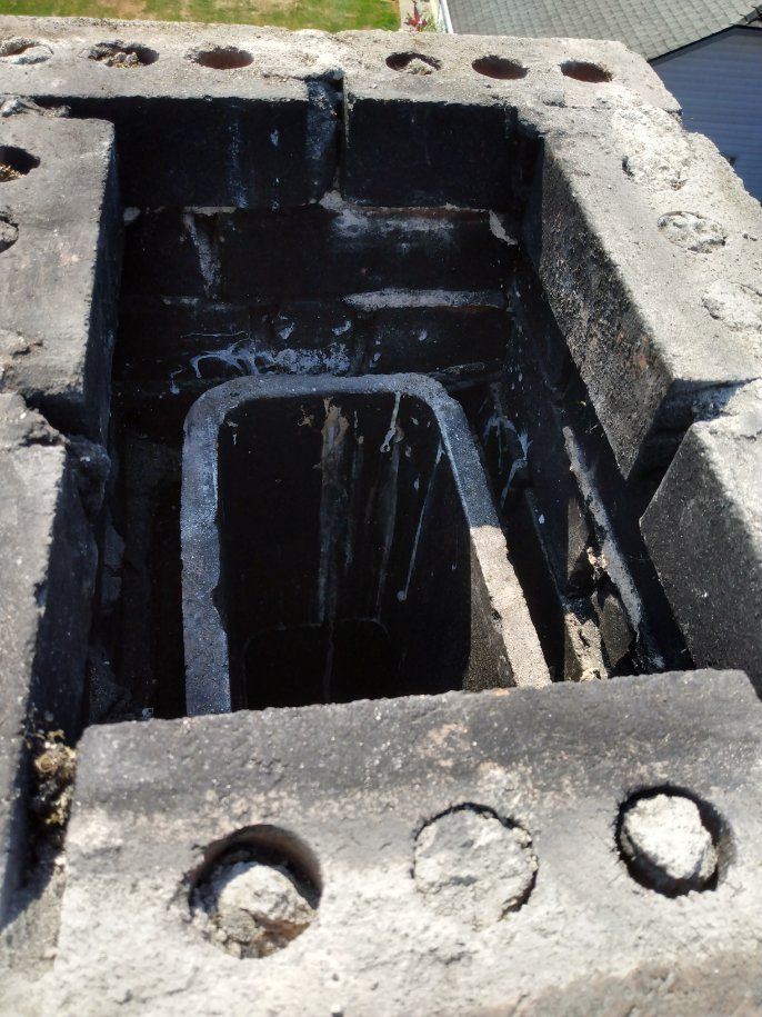 A close up of a concrete structure with holes in it