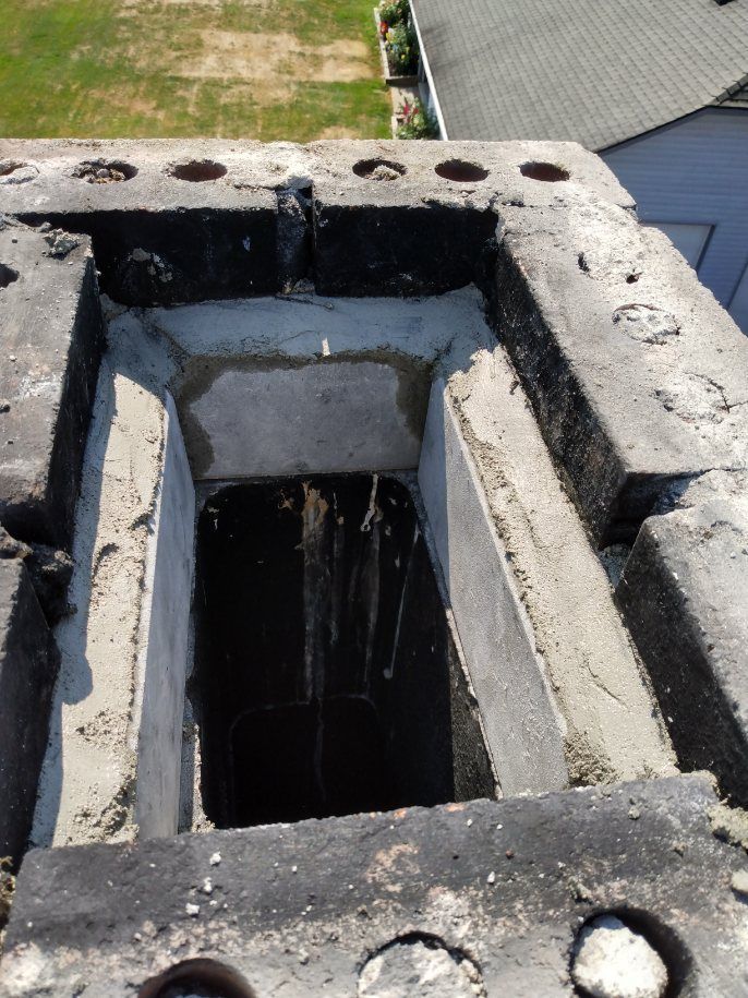 A concrete structure with a hole in the middle of it