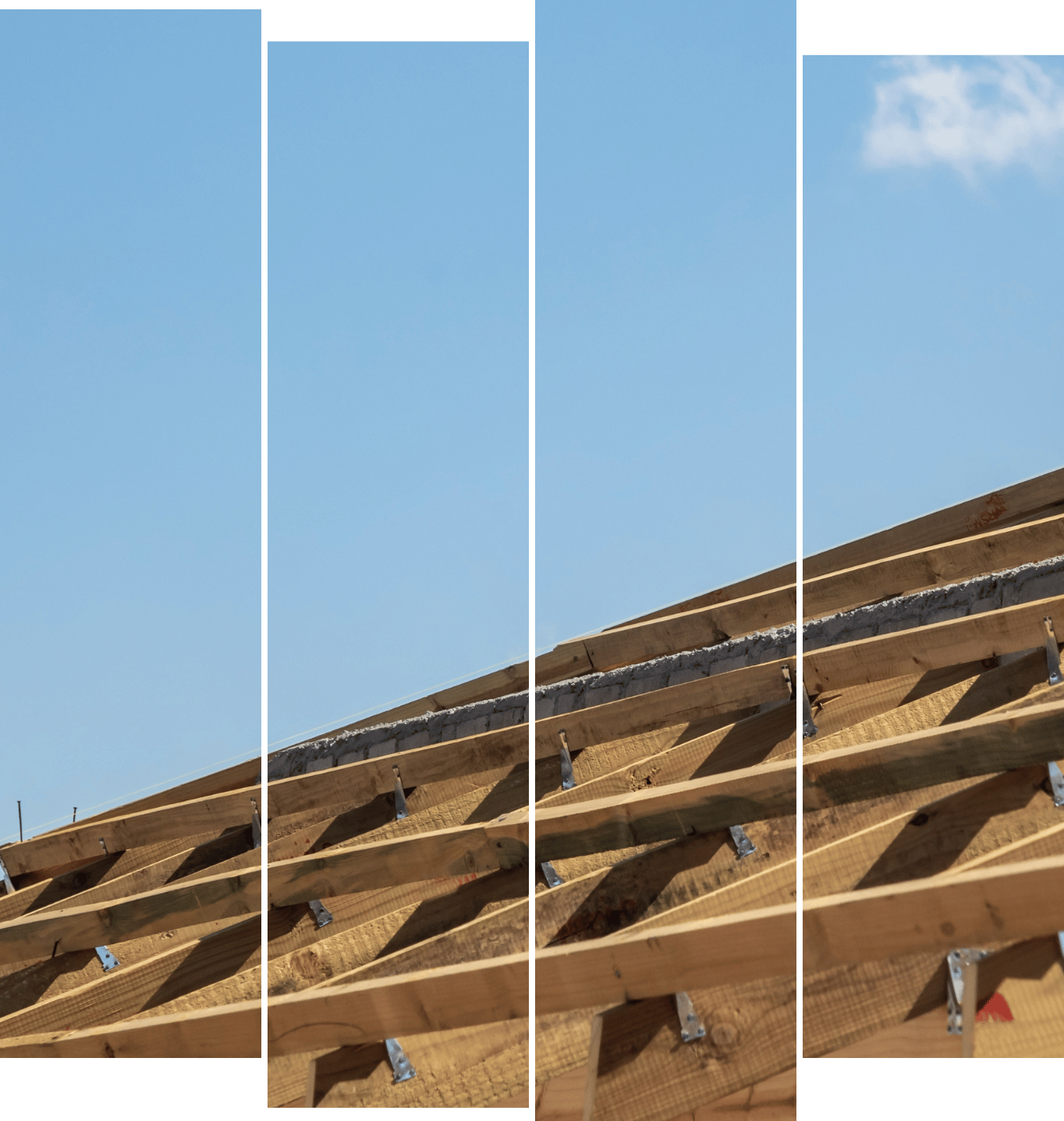 A man is kneeling on top of a tiled roof