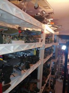 A room filled with shelves filled with lots of toys.