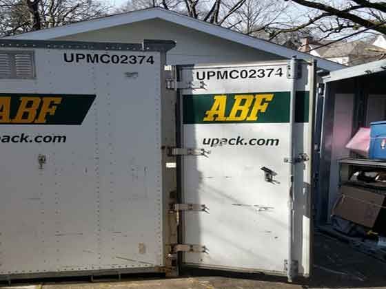 A shed with a door that says abf on it