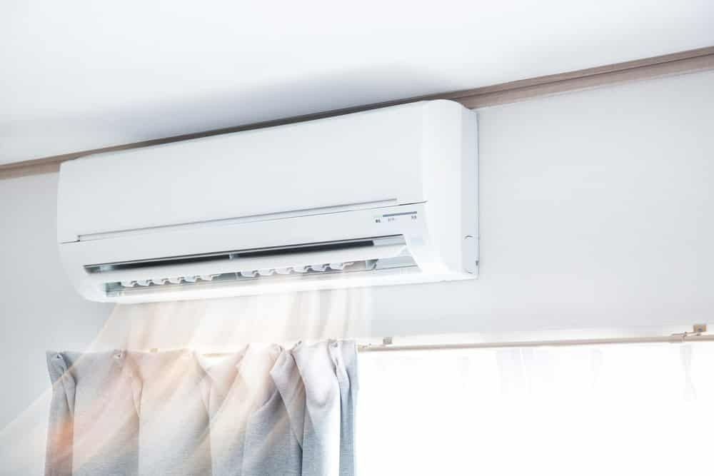 A White Wall-mounted Air Conditioner — McGrath Electrical & Data in Evans Head, NSW