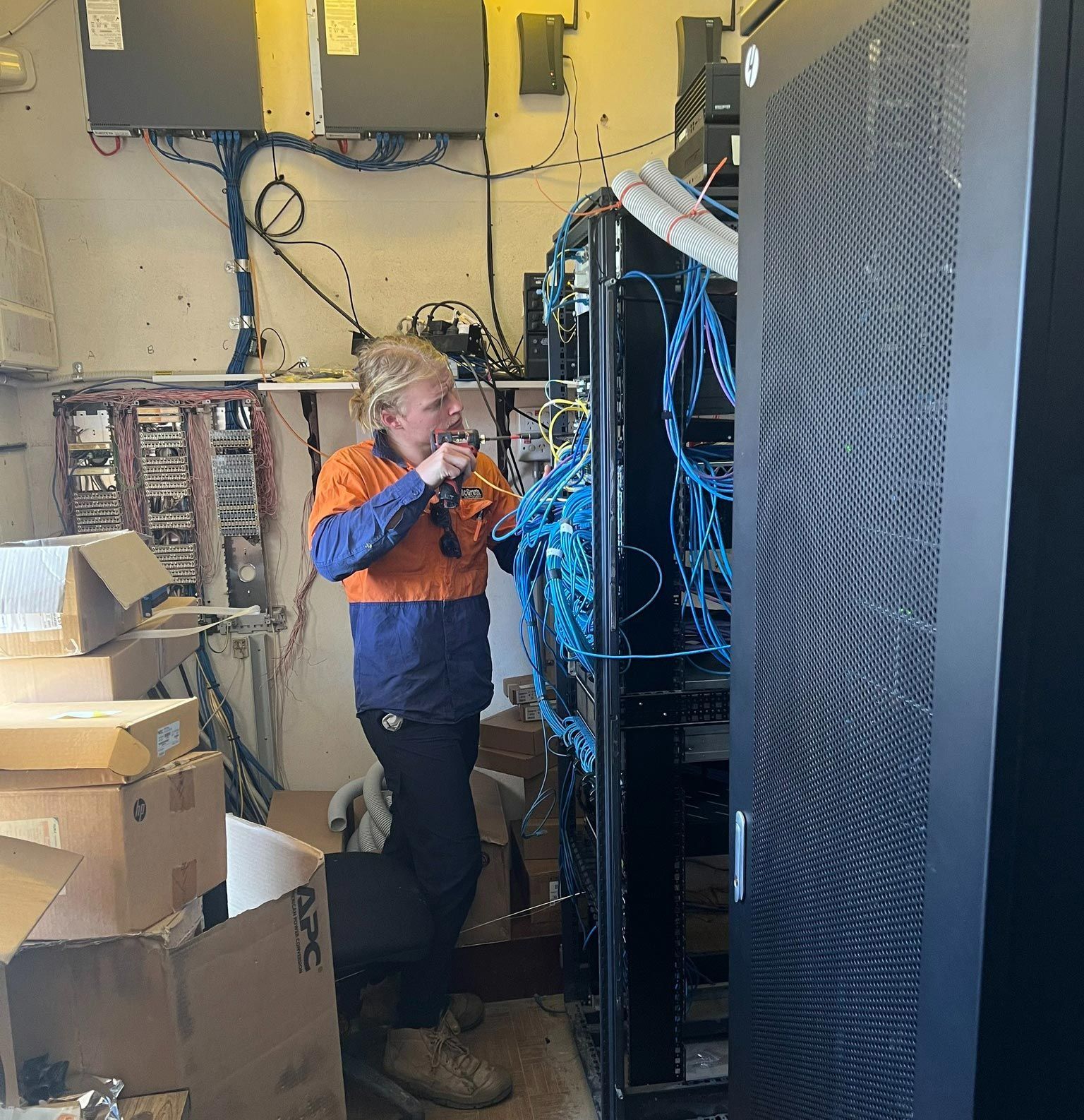 Commercial Electrician At Work