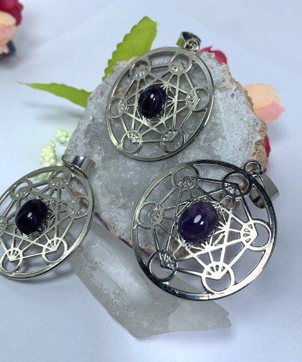 Tres colgantes de plata con piedras de amatista