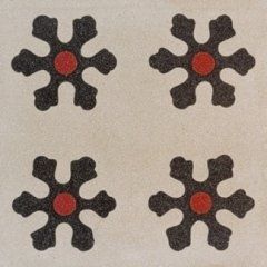 delle piastrelle con dei disegni di fiocchi di neve di color nero e rosso