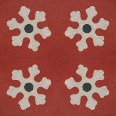 delle piastrelle di color rosso con dei disegni di fiocchi di neve di color bianco